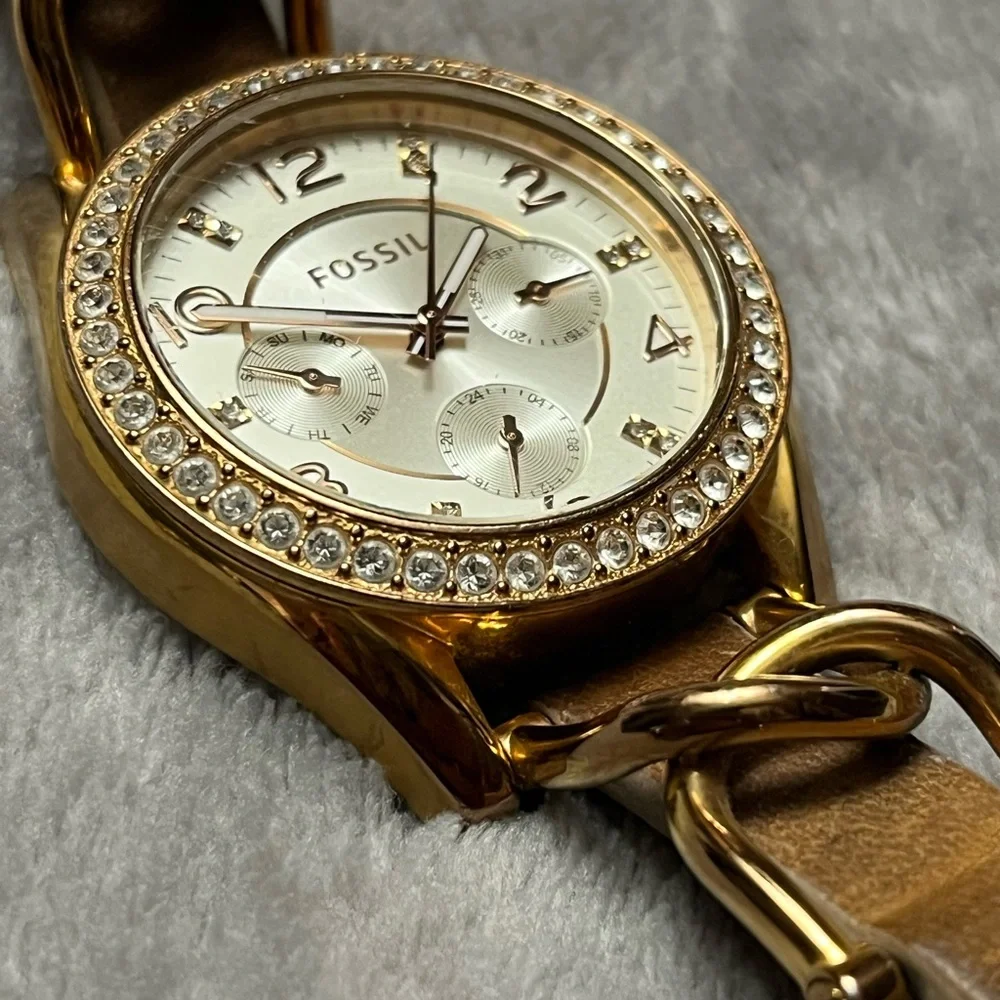 Fossil Watch Collection with Gold, Silver, and Black Accents - Picture 3 of 5